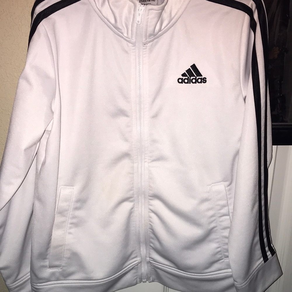 Adidas kids jacket never used.